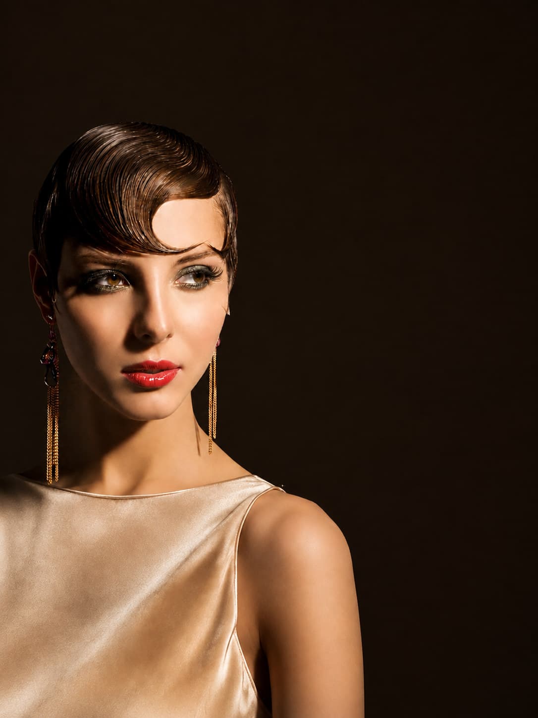 Editorial beauty makeup by Dyana Aives — sculpted eyes and a red lip